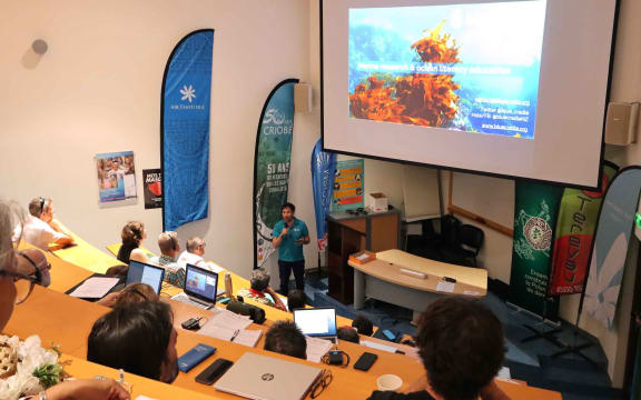 Blue Cradle Founder and CEO James Nikitine in Tahiti leads a workshop on marine invasive species in Tahiti.