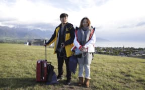 Chinese tourists Xiaolei Chen and Jiangyong are honeymooning in New Zealand. They were evacuated by the Chinese consulate.