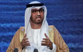 (FILES) In this file photo taken on November 11, 2019, the United Arab Emirates' minister of state and CEO of the Abu Dhabi National Oil Company (ADNOC), Sultan Ahmed al-Jaber, addresses the opening ceremony of the Abu Dhabi International Petroleum Exhibition and Conference (ADIPEC) in the Emirati capital. - The head of the United Arab Emirates' national oil company was named as president of this year's COP28 climate talks on January 12, 2023, promising a "pragmatic" approach to climate action. (Photo by AFP)
