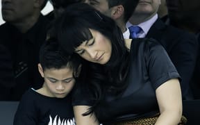Jonah Lomu's wife and son at his memorial service at Eden Park