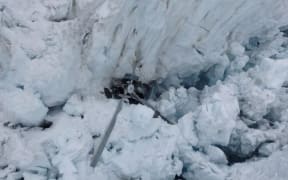 The wreckage of the helicopter on Fox Glacier.