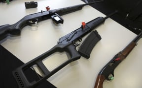A selection of firearms which are now prohibited, on display to media at a police press conference