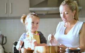 Carine Claudepierre baking with daughter, Emma