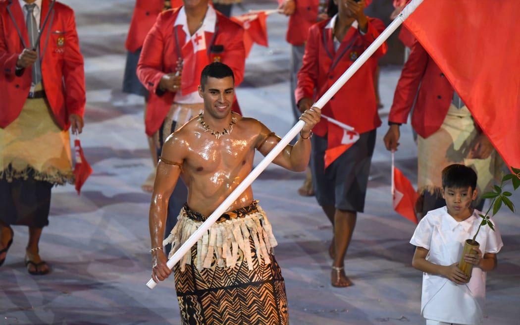Tonga's flagbearer Pita Nikolas Taufatofua leads his delegation during the opening ceremony of the Rio 2016 Olympic Games.