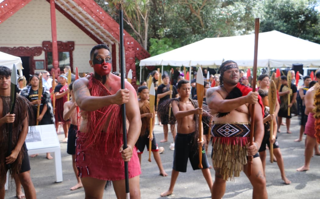 Politicians being welcomed onto Te Whare Runanga on the Treaty grounds at Waitangi.