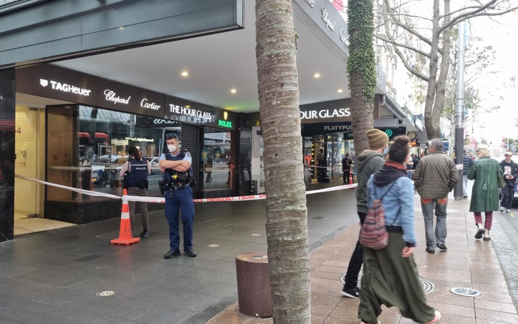 Police at the scene of a brutal daylight robbery in central Auckland.