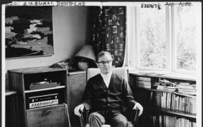 Douglas Lilburn in the sitting room of his home at 22 Ascot Terrace, Thorndon, Wellington, circa 1970.