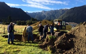 Tom McCready (left) and Andrew McGregor - independent air accident investigators at dig site Fox Glacier in March 2014