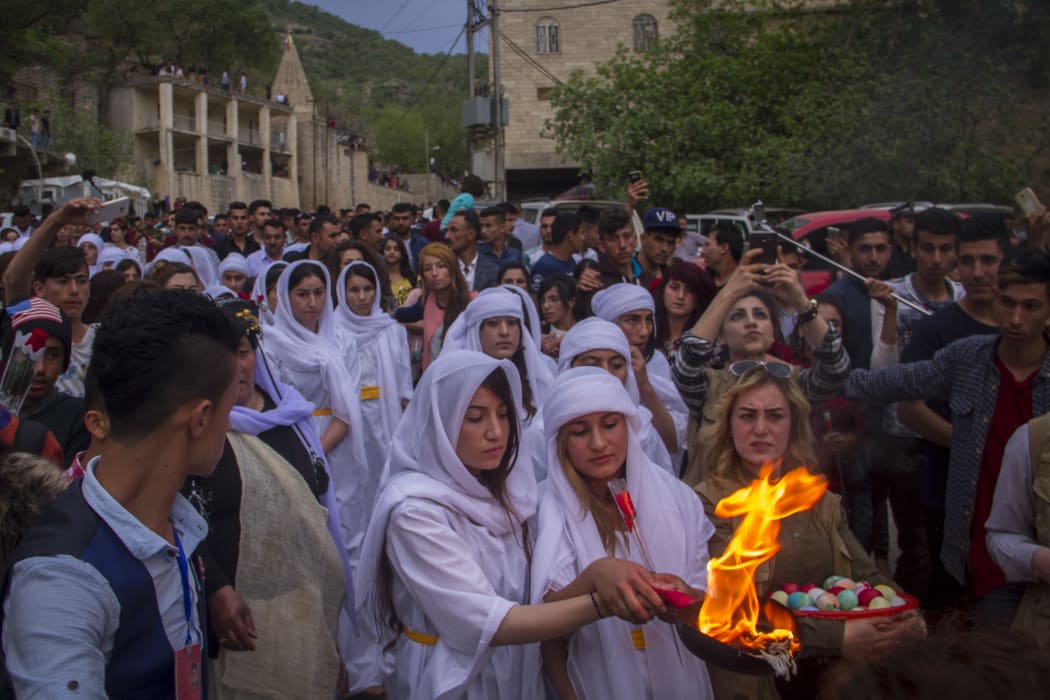 Iraqi Yezidis gather to celebrate Yezidi New Year, known as Chwarshaba Sor or Red Wednesday, in Dohuk on 18 April this year.