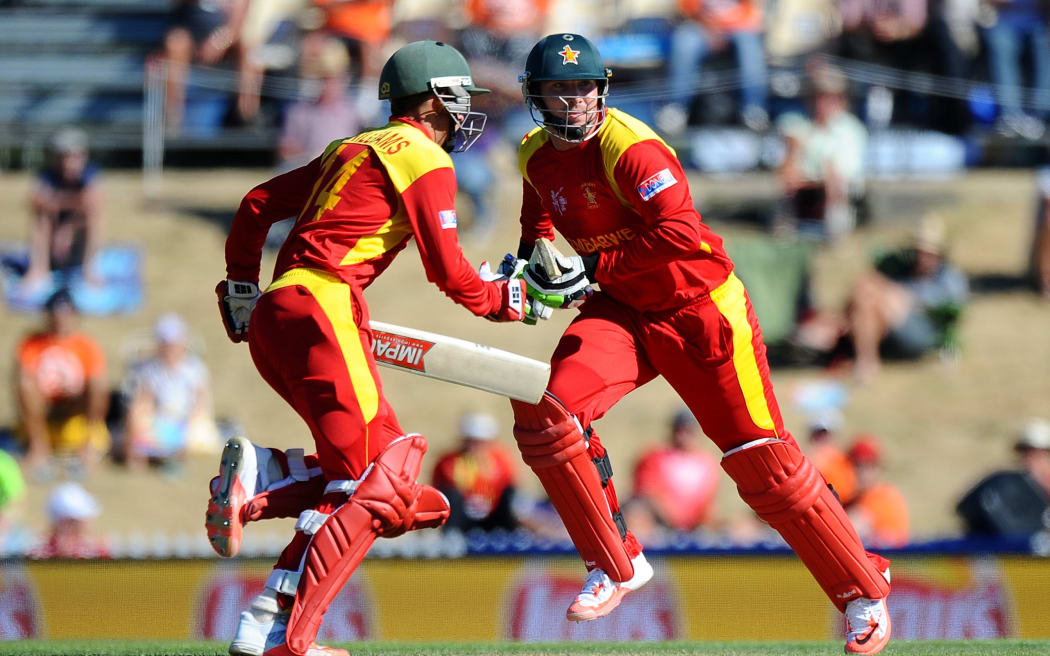 Zimbabwe's Brendan Taylor (R) and Sean Williams in action at the World Cup