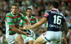 Sam Burgess takes on Sonny Bill Williams during a Roosters vs Rabbitohs game in 2013.