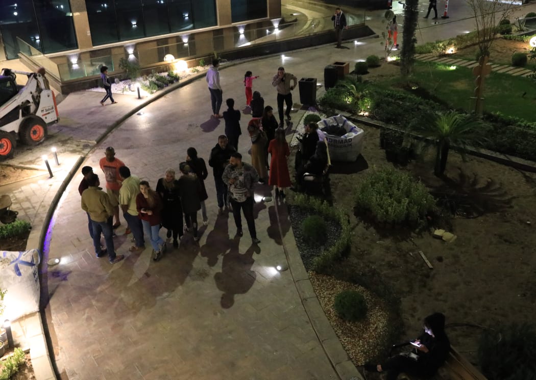 People in Erbil wait outside of the buildings after 6.4 magnitude earthquake hits western Iran near its border with Iraq.