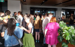 Guests arriving at the Green Party's election night party at the Grid X building in Auckland.