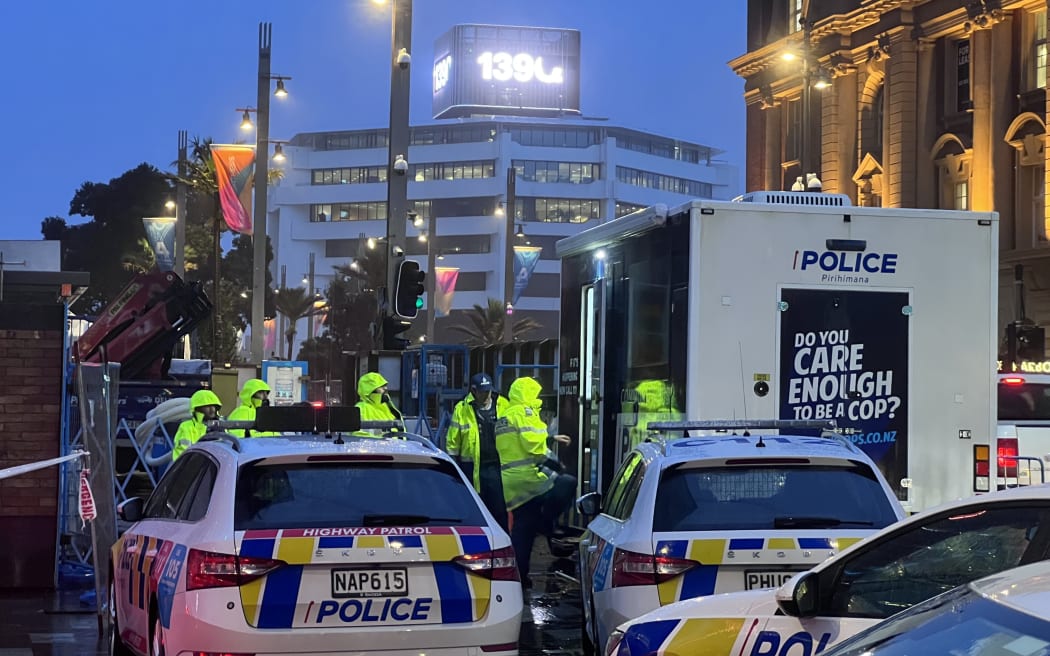 Police in central Auckland the day after the construction site shootings.