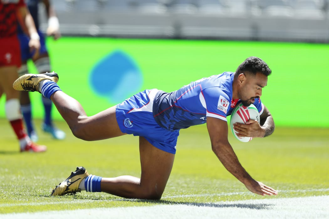 Samoa captain David Afamasaga scores a try during the Cape Town Sevens.