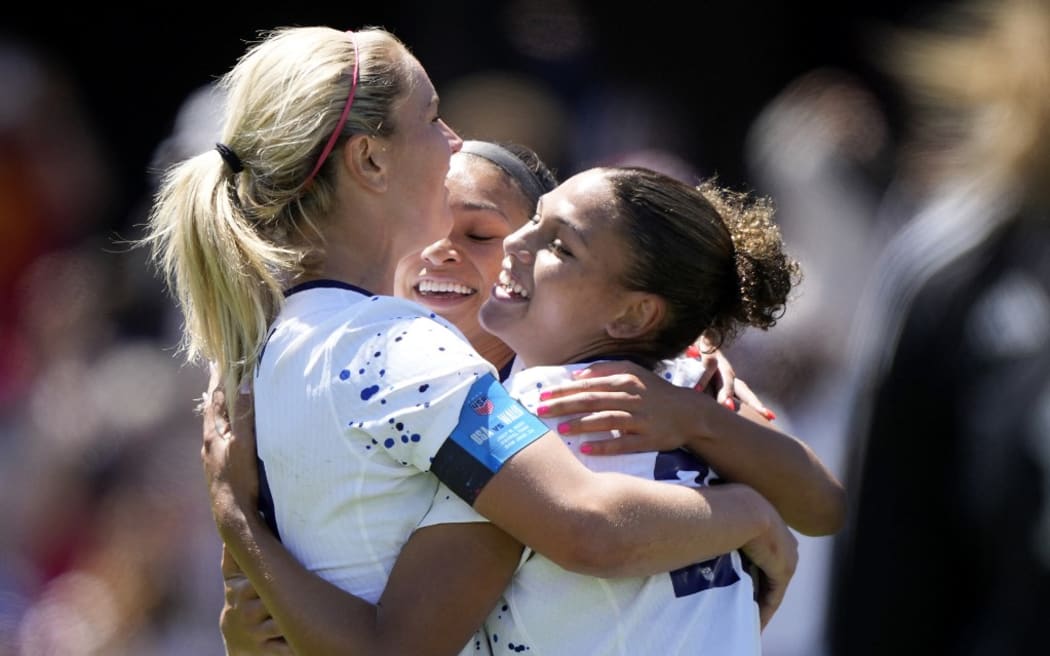 The USA's Trinity Rodman (R) celebrates with teammates after scoring a goal against Wales in their final tune-up match before the World Cup.