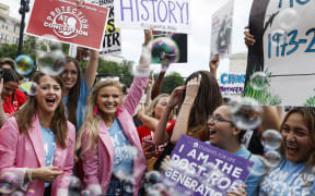 WASHINGTON, DC - JUNE 23: Anti-abortion right activists celebrate after the announcement to the Dobbs v Jackson Women's Health Organization ruling in front of the U.S. Supreme Court on June 24, 2022 in Washington, DC. The Court's decision in Dobbs v Jackson Women's Health overturns the landmark 50-year-old Roe v Wade case and erases a federal right to an abortion.   Anna Moneymaker/Getty Images/AFP (Photo by Anna Moneymaker / GETTY IMAGES NORTH AMERICA / Getty Images via AFP)