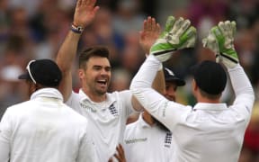 The England bowler James Anderson celebrates taking a wicket.