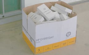 Box of condoms laying idle at Port Moresby General Hospital, Papua New Guinea.