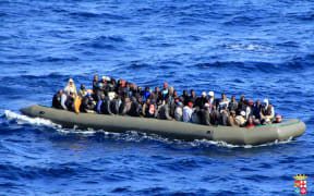 One of the migrant boats spotted by the Italian Navy on Thursday.