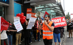 ANZ workers protest in Newmarket, as part of a disagreement between the bank and FIRST Union.
