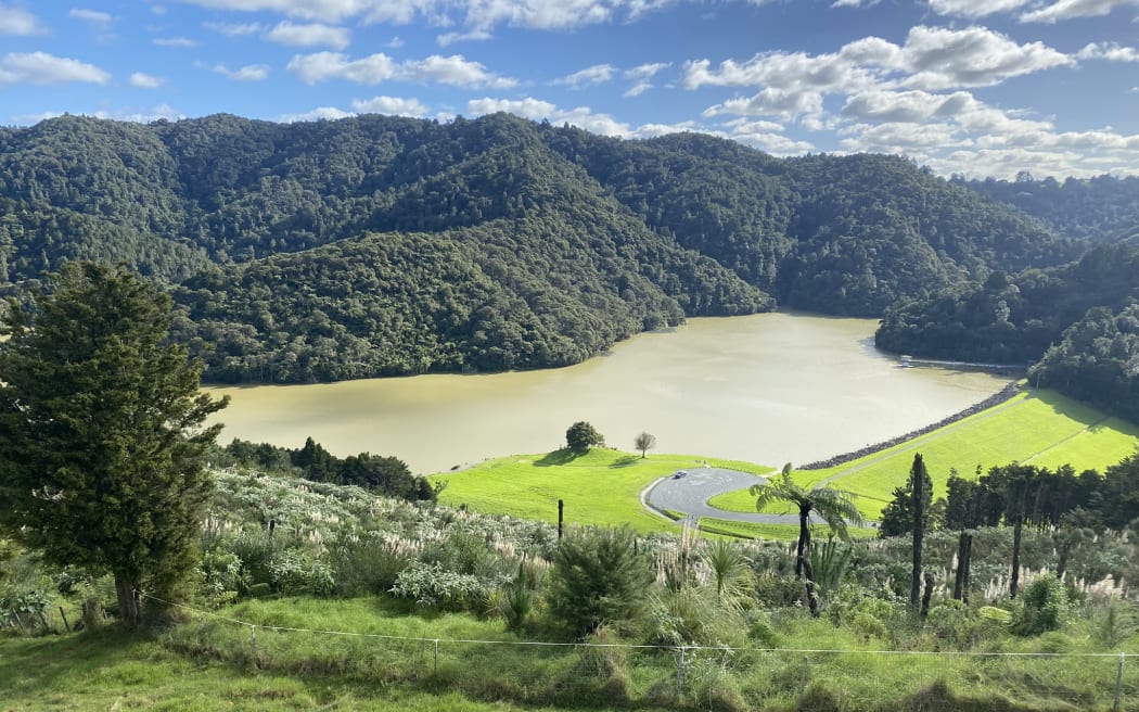 Whau Valley Dam from the air, its main bellmouth spillway showing in the water at right
(Photo supplied, WDC PLEASE CREDIT)