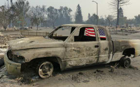 A burnt out car in Santa Rosa, US.