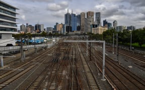 A general view shows train tracks next to Melbourne Park on day six of the Australian Open tennis tournament in Melbourne on 13 February