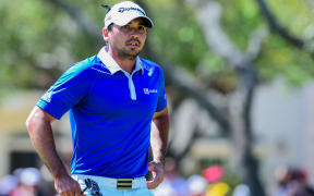 Jason Day walks off the 5th green during the WGC match play final.