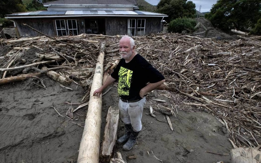 cameroon timber Steve Wheeler has silt up to two metres deep blanketing his Esk Valley property, plus thick slash which came down the Esk River and stopped at his lounge windows. Wheeler says his double-walled home, which he built himself, saved the lives of him and his family.