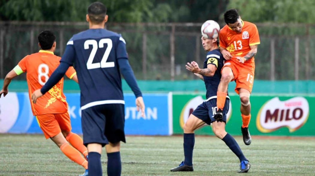Guam captain Jason Cunliffe challenges for the ball during the Matao's FIFA World Cup and Asian Cup first round qualifying match in Bhutan.