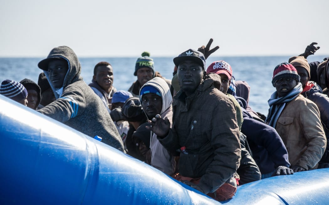 An inflatable boat with 47 migrants on board being rescued off Libya's coast on January 19, 2019. The German charity group Sea Watch said it was not known if they belonged to the same group that was feared missing off the Libyan coast.