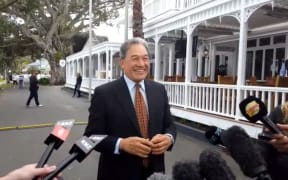 Winston Peters speaks to reporters on Russell's waterfront