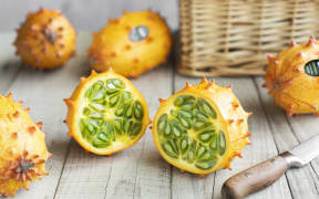 The edible green inside of a kiwano is cucumber and passionfruit-like.
