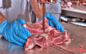 meat processing (stock photo)