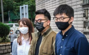 Hong Kong activists Agnes Chow, Ivan Lam and Joshua Wong.
