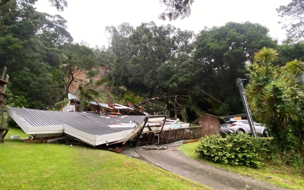 One of many houses on Domain Cres that got hit by slips from above.