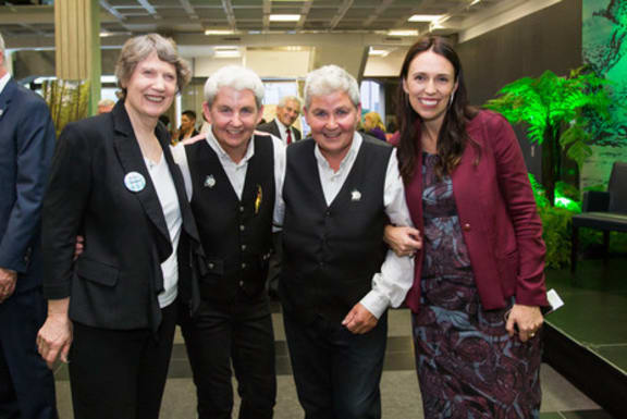 Helen Clark, Jools and Lynda Topp, and Jacinda Ardern at the launch of the Topp Twins' exhibition at the National Library, Wellington, 26 March 2018