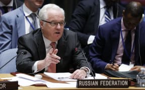 Russian permanent representative to the United Nations Vitaly Churkin addresses United Nations Security Council during an emergency meeting on the situation the situation in Syria, at the UN headquarters in New York.