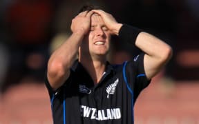 The Black Caps Matt Henry is disappointed after a catch is dropped.