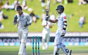 Sri Lanka's Kusal Mendis celebrates his 50 on day 4 of the first cricket Test against NZ.