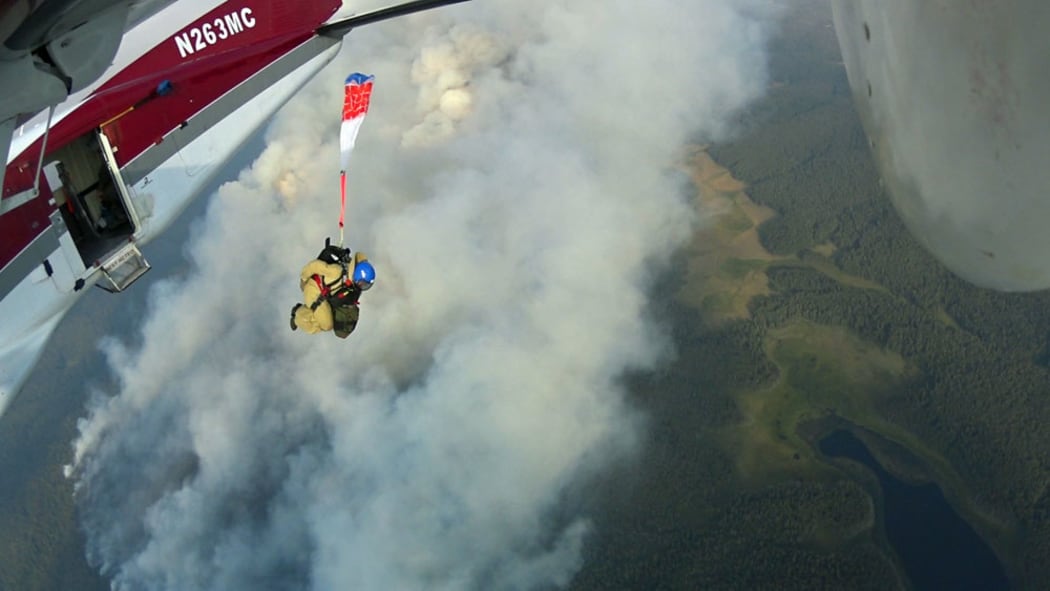 A smokejumper from West Yellowstone, Montana jumps the Bear Lake Fire, August 24, 2014