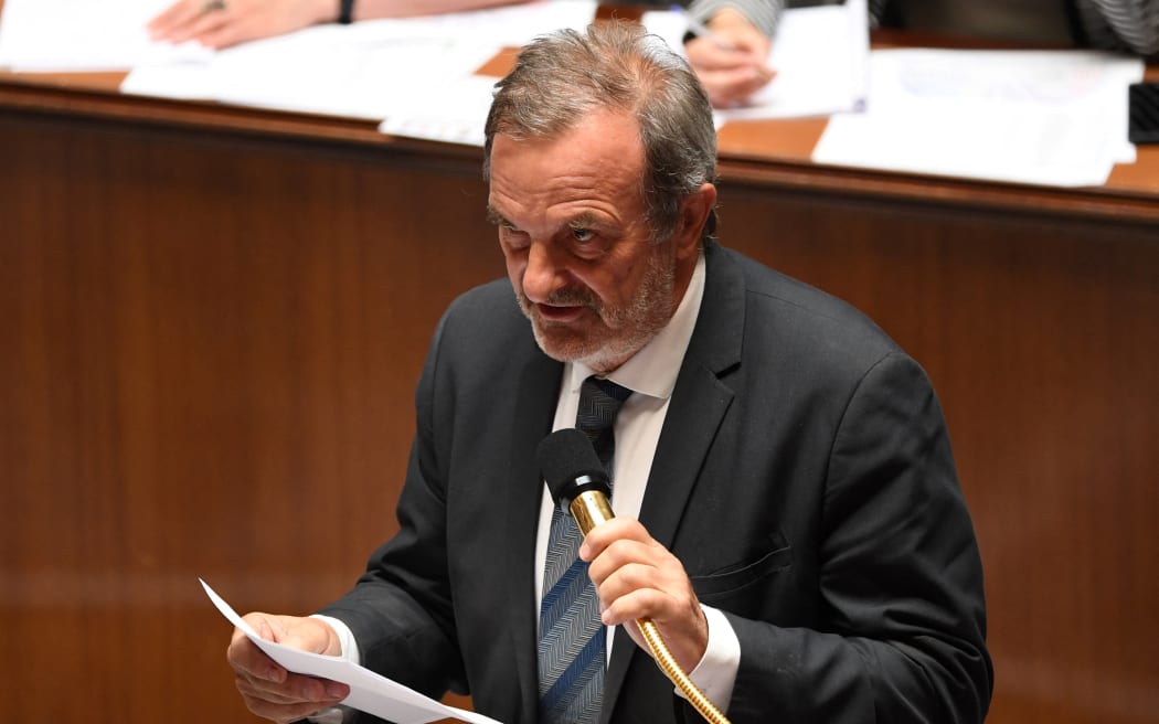 French Junior Minister for Overseas Jean-Francois Carenco speaks during a session of questions to the government at The National Assembly in Paris on July 12, 2022. - French Prime Minister survived on July 11, 2022 her first no-confidence vote in parliament, which had been sponsored by the hard-left opposition. (Photo by BERTRAND GUAY / AFP)