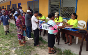 Marshall Islanders line up to vote at a Majuro elementary school during the 2015 national election.