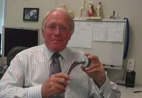 Orthopaedic Association president, Wellington surgeon, Brett Krause, shows replacement hip joint in his rooms.