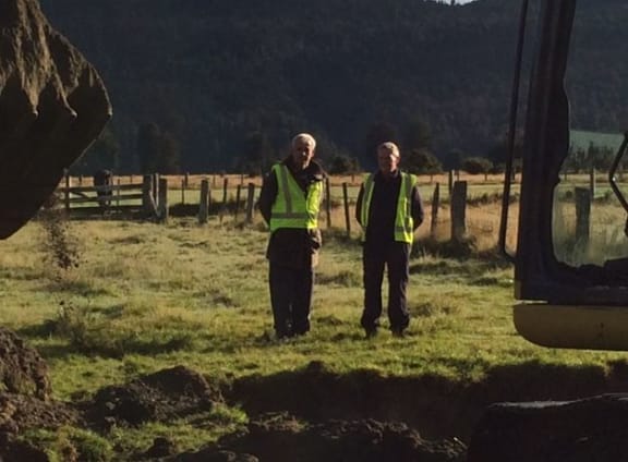 Tom McCready (left) and Andrew McGregor - independent air accident investigators at dig site.