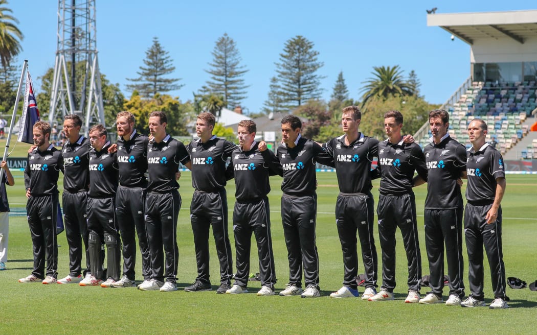 The Black Caps sing the national anthem.