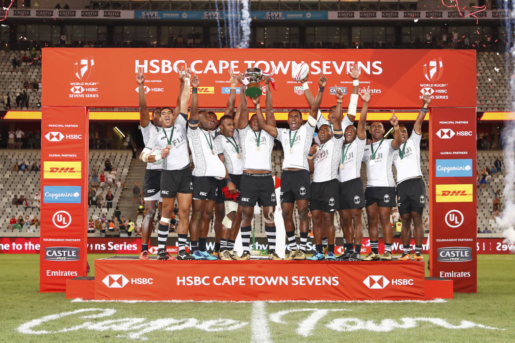 Fiji players celebrate winning the Cape Town Sevens.