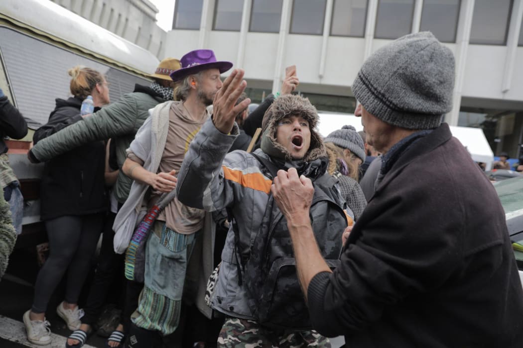 In photos: Early morning clash between police and protesters in ...