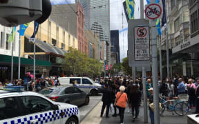 A car has hit pedestrians in the centre of Melbourne, killing at least one person, Australian emergency services say.